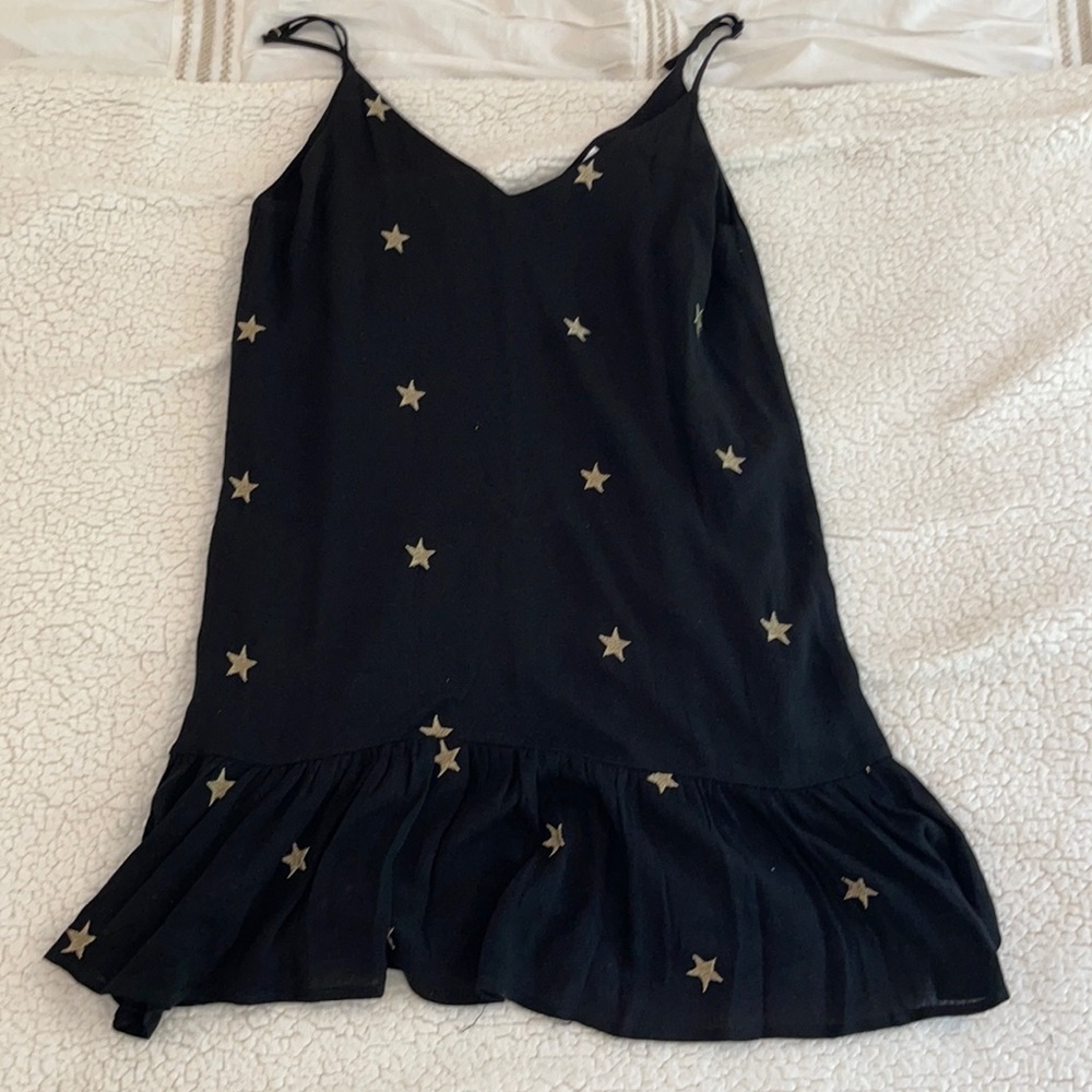 black dress with gold stars